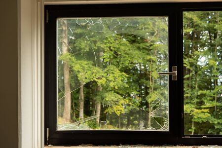 Broken Window after gutting a buildingの写真素材