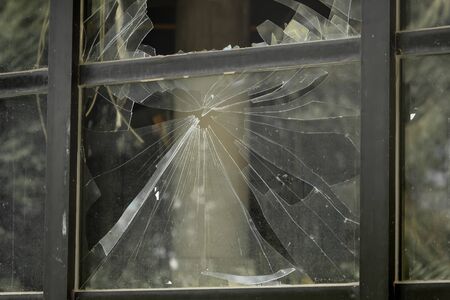 Broken Window after gutting a buildingの写真素材