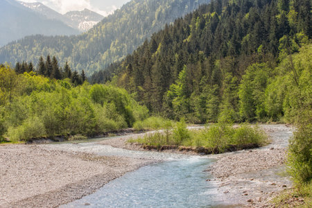 A wild river in the midst of impressive natureの写真素材