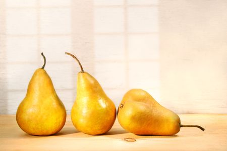 Three pears on the tableの写真素材