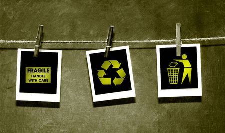 Photo paper attached to rope with clothes spins on grunge  background/Environment themeの写真素材