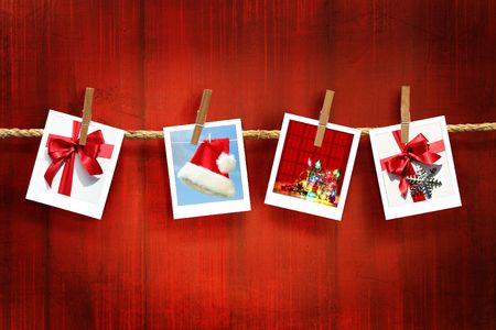 Photos frames on rustic red wood backgroundの写真素材