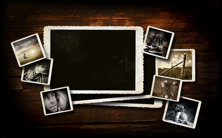 Scrap-booking  background on dark wood with photosの写真素材