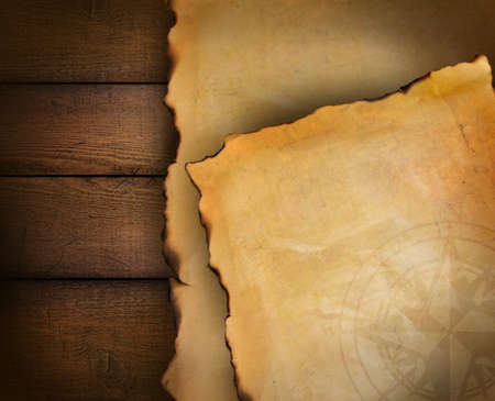 Closeup of parchment papers on wood backgroundの写真素材