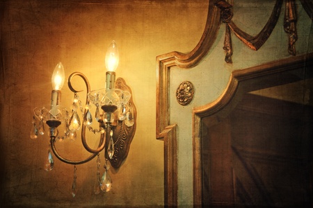 Antique wall light sconce with mirror and vintage backgroundの写真素材