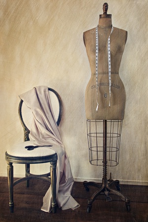 Antique dress form and chair with vintage look の写真素材
