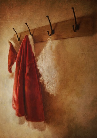 Digital painting of Santa costume hanging on rackの写真素材
