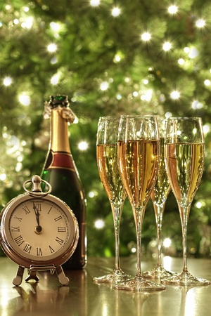 Glasses of champagne for the countdown to New Yearsの写真素材