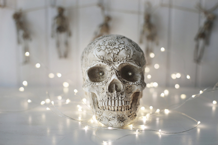 Scary skull with lights in backgroundの写真素材