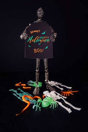 Metal mannequin holding Halloween signの写真素材