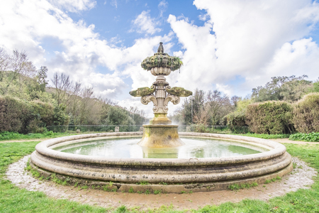 Italy, Rome, Villa Dora Pamphili - 06 March 2016: I found this beautiful and antique fountain in the park, the view is spectacular and the sound transmits tranquilityの写真素材