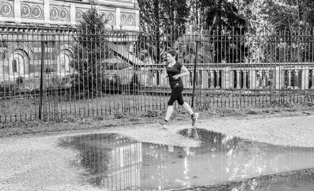 Italy, Rome, Villa Dora Pamphili - 06 March 2016: There walkers and runners in the park of Villa Doria Pamphili, here are some shots in black whiteのeditorial素材