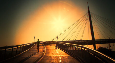 Early morning Run on the Bridge, Pescara, Italyの写真素材