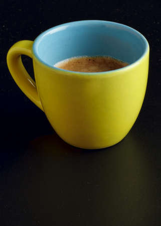 Italian Espresso coffee, isolated cup, black background