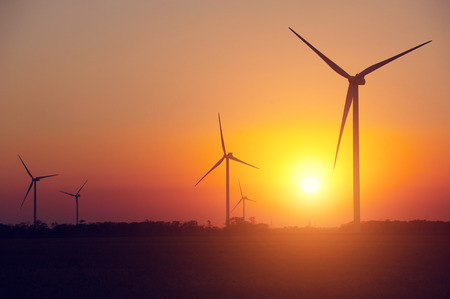 Wind turbines at sunsetの写真素材
