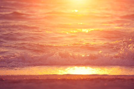 Soft wave of sea at sunsetの写真素材