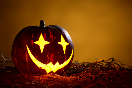 Halloween Pumpkin in a form of jokerの写真素材
