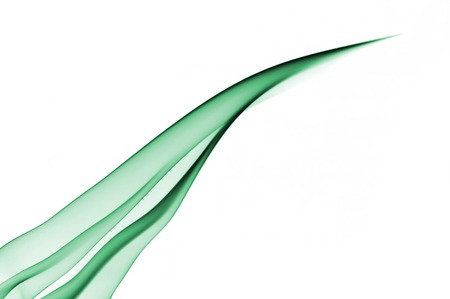 Green abstract smoke from the aromatic sticks on a white background.の写真素材
