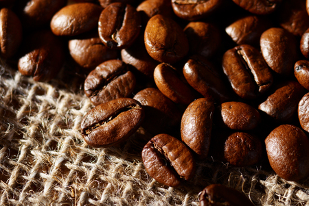 coffee beans on the clothsack backgroundの写真素材