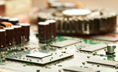 Microprocessor with motherboard background. Computer board chip circuit. Microelectronics hardware concept.の写真素材
