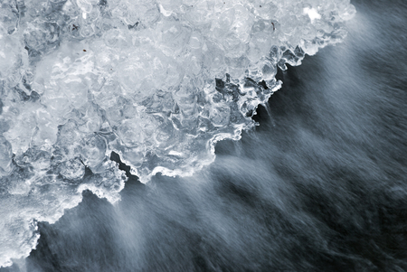 Frozen ice waterfall on the rockの写真素材