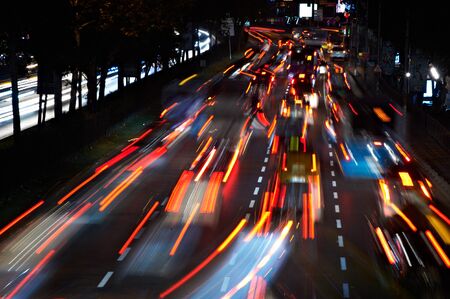 Blurred Tail Lights And Traffic Lights On Motorwayの写真素材