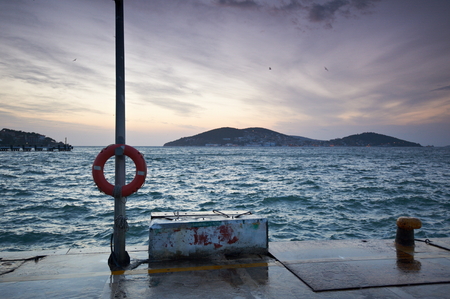 The pictursque pier of Buyukada, Istanbul at sunsetの写真素材