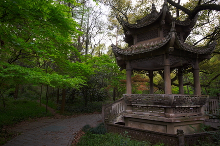Stone pavilion in the chinese garden. Hangzhou, China.の写真素材
