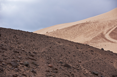 Valley in the Sinai desert with sand dunes and mountainsの写真素材