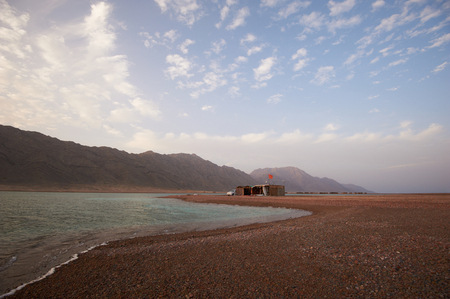 Beautiful landscape with calm sea and villageの写真素材