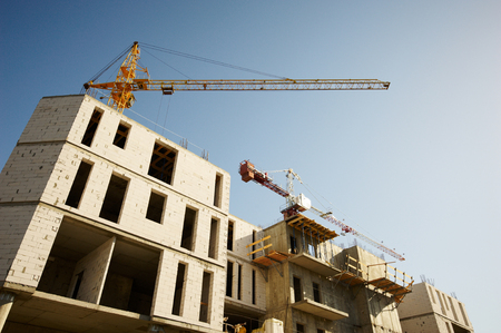 A cranes building of a skyscraperの写真素材
