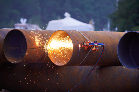 Automatic gas cutter cuts the pipe.の写真素材