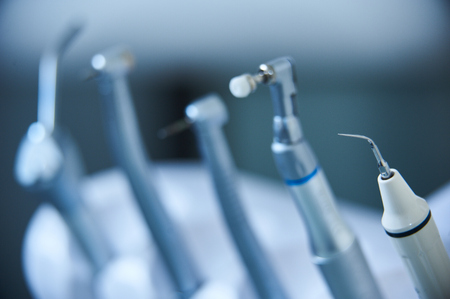 Modern dental equipment close up on a blue backgroundの写真素材