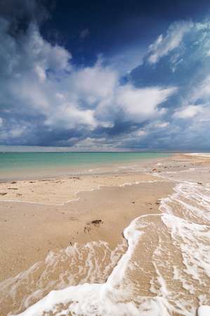 Image of the beach and dramatic sky.の写真素材