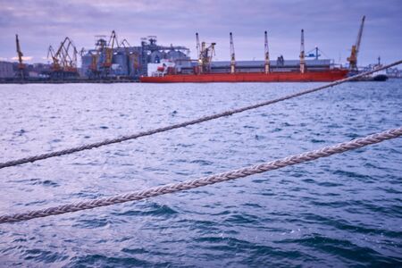 cargo ship in port - large container ship dockedの写真素材
