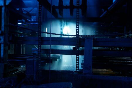 Industrial zone, Steel pipelines, ladders and machines.