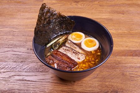 Traditional Japanese soup ramen noodles, sliced chiken, eggs Close upの写真素材