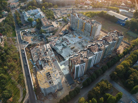 New private housing development construction in the city aerial view. Drone photo.