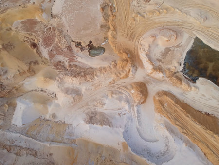 Aerial view over the quartz sand quarry. Industrial place in Ukraine. Nobody