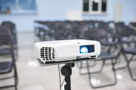 Video projector in conference hall, no peopleの写真素材