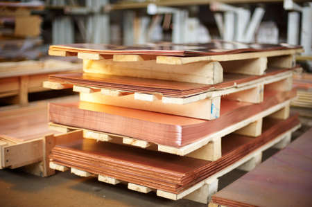Many copper sheets, warehouse copper plates. close up