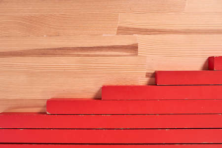 red rods montessori close up on wooden table.の写真素材