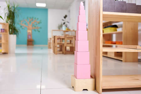 Light class in Montessori kindergarten. The pink tower is in the foreground. nobody.の写真素材