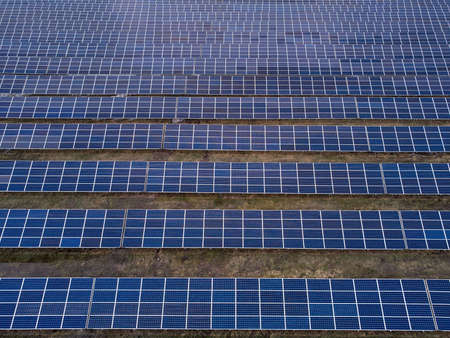 Aerial view of solar power station in the field for generation power from sun. no people