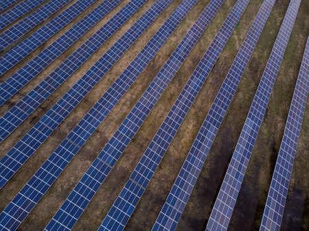 Aerial view of solar power station in the field for generation power from sun. no people