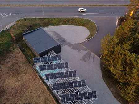 solar panel charging station for electric vehicles near the highway, no people