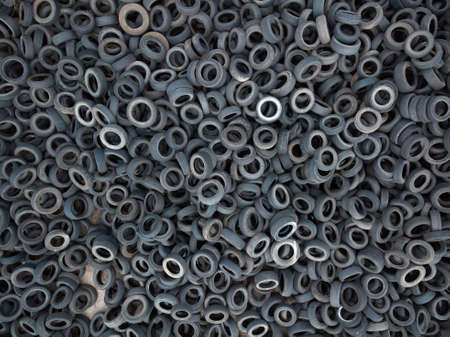 Aerial view of old tires. Many car and truck tires on dump site from above. Aerial viewの写真素材