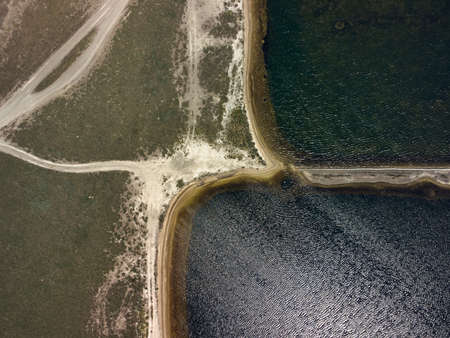 aerial top view of islands and shallows on the Sivash salt lake near the sea of Azovの写真素材