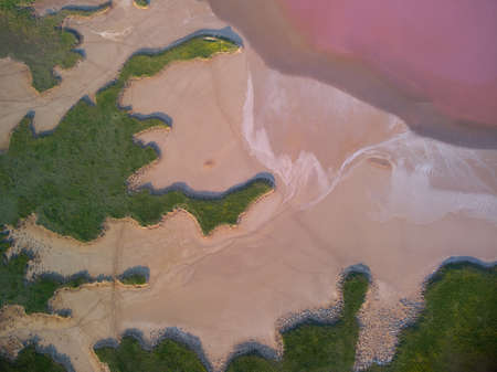 Aerial top view of a pink salt lake. Azov Ukraineの写真素材