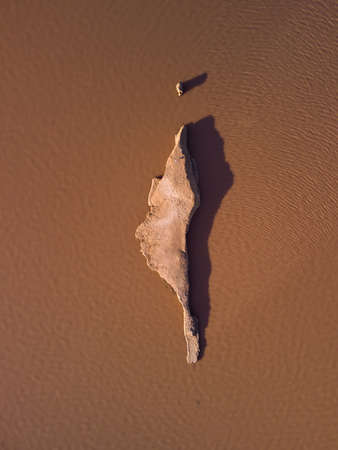 Aerial top view of a pink salt lake. Azov Ukraine